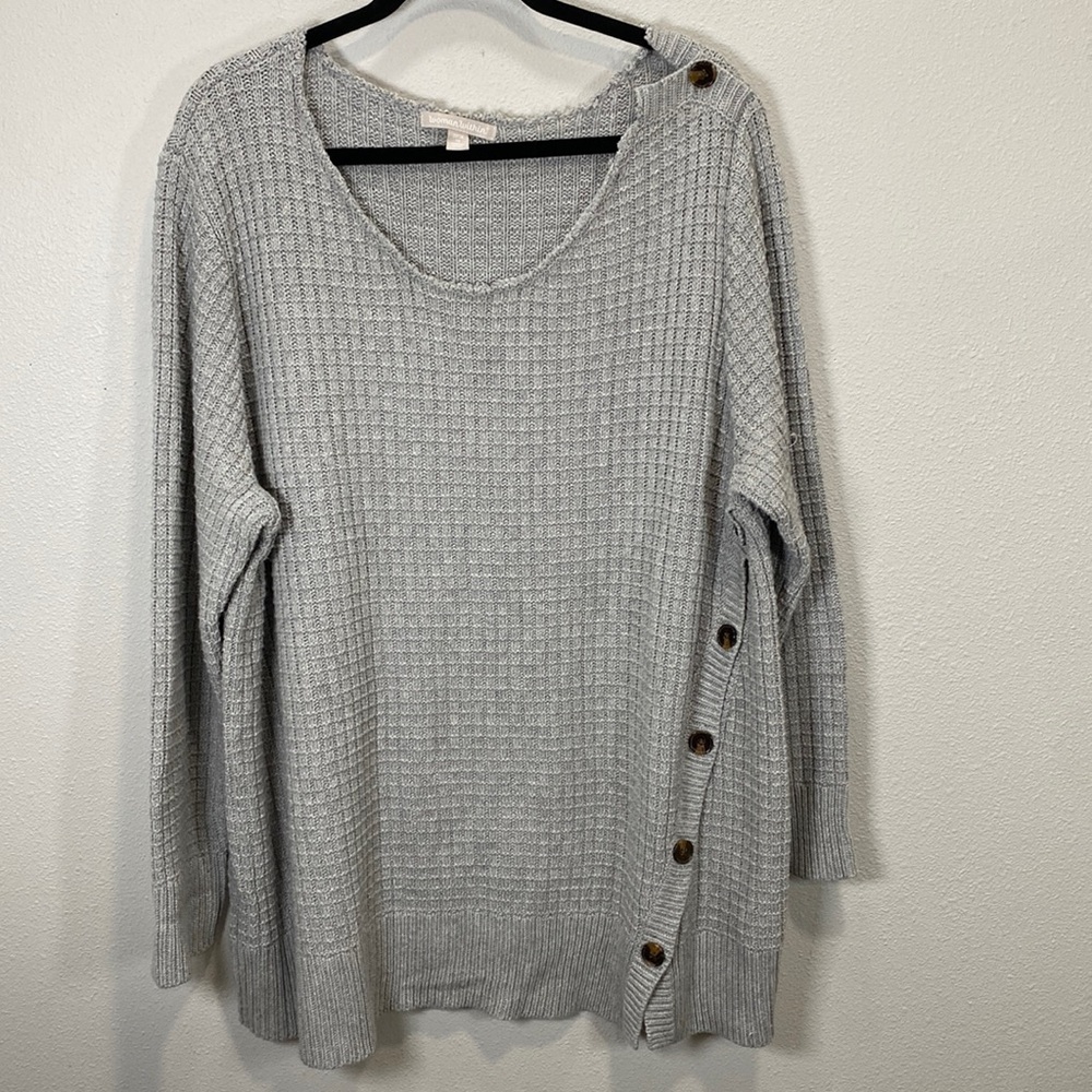 Woman within waffle knit gray sweater button side detail